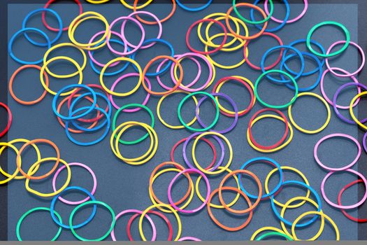 Diversity concept. mix colorful rubber band on black background