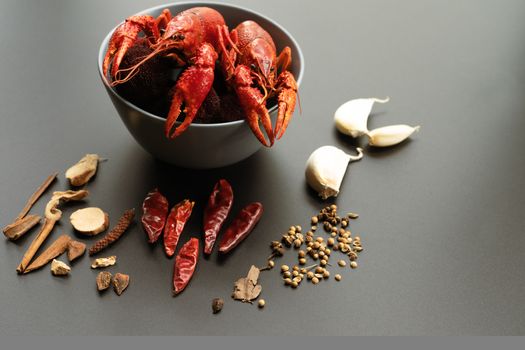 Crayfish red, Baby Lobster with herb for stir fry on black background