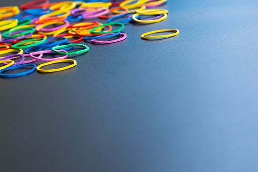Leadership business concept. yellow color rubber band lead other color with copy space