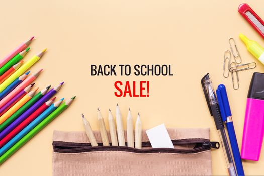 Welcome back to school sale background, colorful color pencil and stationery bag on yellow backgrounds with copy space