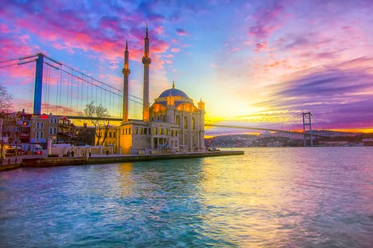 Ortakoy Istanbul landscape beautiful sunrise with clouds Ortakoy Mosque and Bosphorus Bridge, Istanbul Turkey. Best touristic destination of Istanbul.