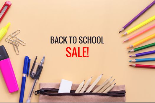 Welcome back to school sale background, colorful color pencil and stationery bag on yellow backgrounds with copy space