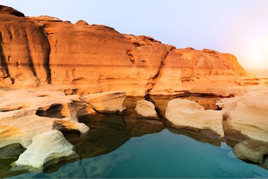 Sunrise new day at Sam Phan Bok, as known as the Grand Canyon of Thailand, the biggest rock reef in the Mae Khong River, in Ubon Ratchathani province, Thailand