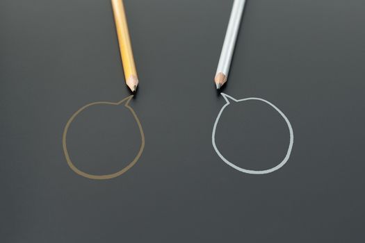 Community communication, represents people conference, social media interaction & engagement. two pencils sharing idea on the black background with copy space