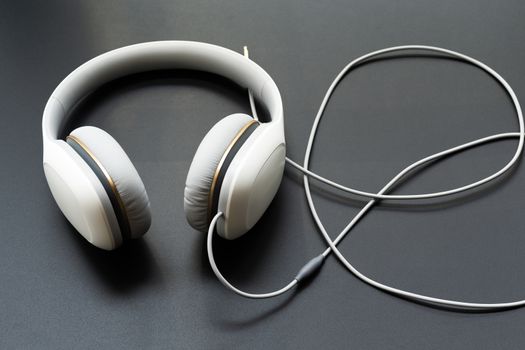 Headphones white isolated on a black background
