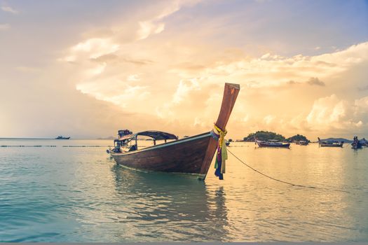 beautiful sunrise and long tailed boat, fishing boat, motor boat