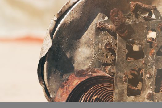 Labor Day Concept. Long life gear on the old motor, closeup