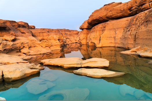 Sunrise new day at Sam Phan Bok, as known as the Grand Canyon of Thailand, the biggest rock reef in the Mae Khong River, in Ubon Ratchathani province, Thailand