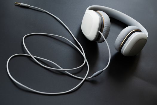 Headphones white isolated on a black background