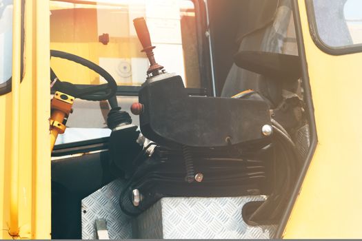 Labor Day Concept. excavator driver seat closeup
