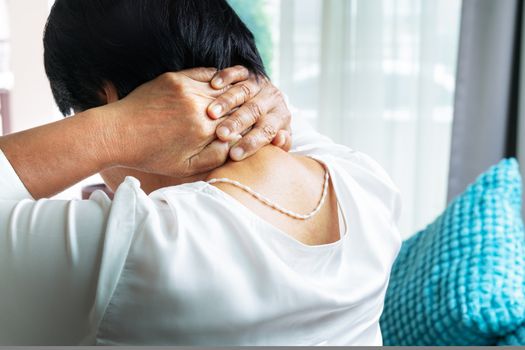 old woman suffering from neck pain, closeup, health problem concept
