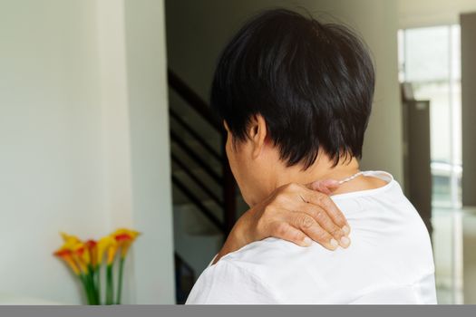 neck and shoulder pain, old woman suffering from neck and shoulder injury, health problem concept
