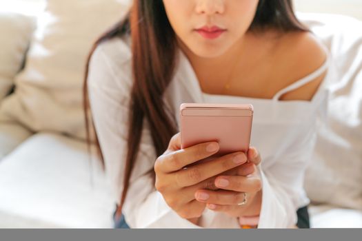 young women shopping online on smartphone. business and modern social lifestyle concept
