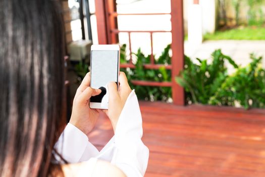 young women shopping online on smartphone. business and modern social lifestyle concept