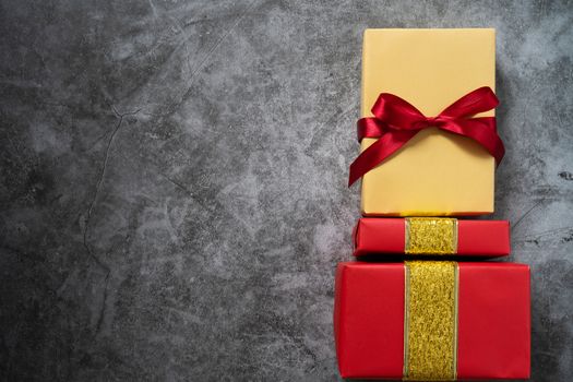 Boxing day Sale concept Christmas gift box on cement background, top view
