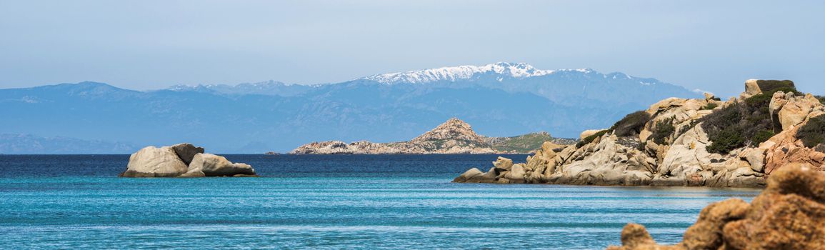 the beautiful island of maddalena , compared with the maledives, with blue sea and the mountains as background, you travel here by ferry from palau