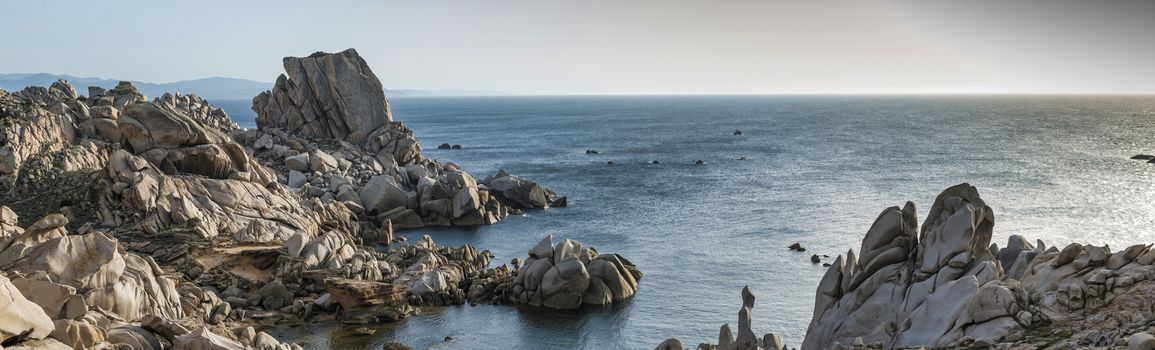 capo testa teresa di gallura , with rocks and blue sea on the italian island of sardinia