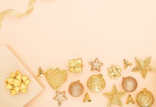 gifts boxes or presents boxes with golden bows, star and ball on golden background for birthday, christmas or wedding ceremony
