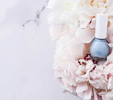 Nail polish bottles on floral background, french manicure and cosmetic branding design