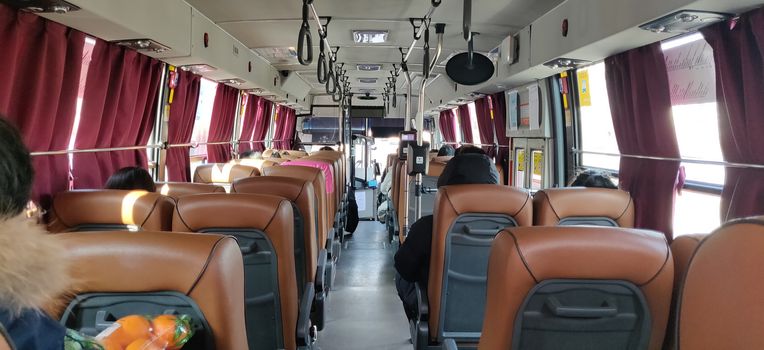 A view from the backside of interiors of a bus in Seoul, South Korea