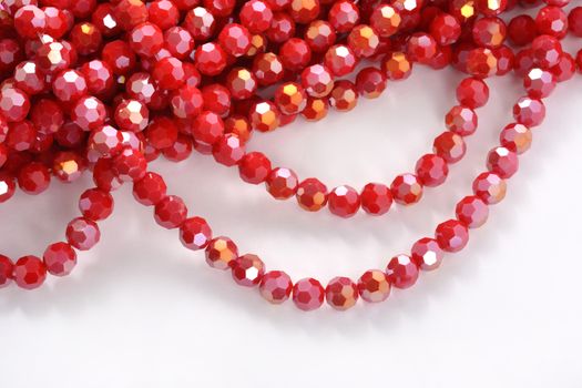 Beautiful Red Glass Sparkle Crystal Isoalted Beads on white background. Use for diy beaded jewelry