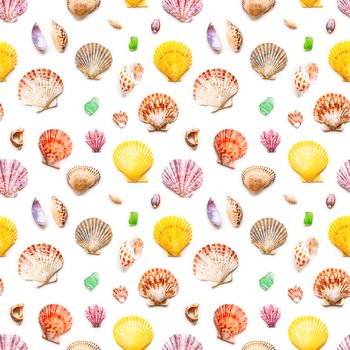 Seamless photo pattern with different sea shells. Flat lay with colorful mollusc shells, corals and wave-worn pieces of glass and stones. Top view on finds from ocean beach.