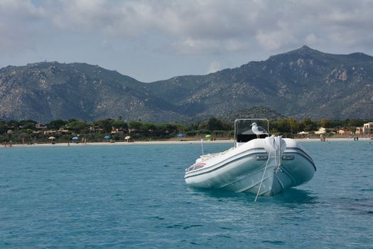 Motorboat in Villasimius near the beach in Sardinia, Italy