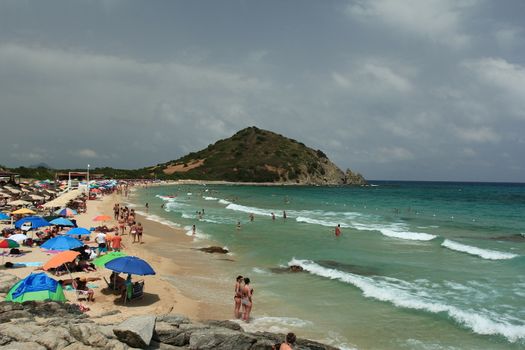 Sardinian rocky and natural beach landscape during a summer day
