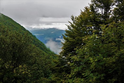 View over some hills of the Vosges in Frnace on a cloudy and rainy day
