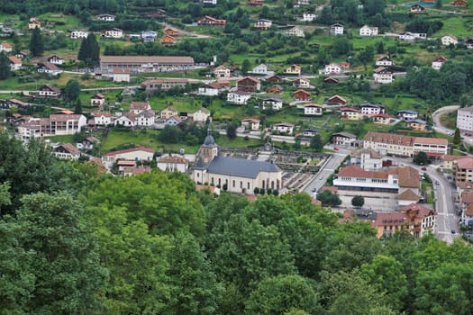 Close-up view over La Bresse, France with focus on the church and cemetery