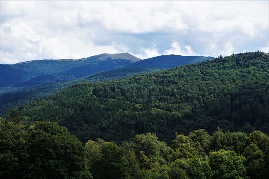 Beautiful green mountain range in front of the Grand Ballon mountain, France