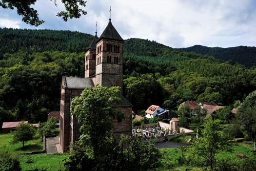 Panoramic view over the Abbey and the cemetery in the village of Murbach, France