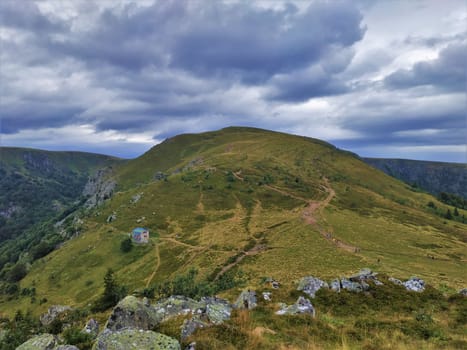 Panorama view over a mountain restaurant to Le Hohneck mountain in the Vosges region of France