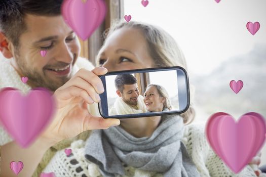 Composite of Couple taking Valentines selfie