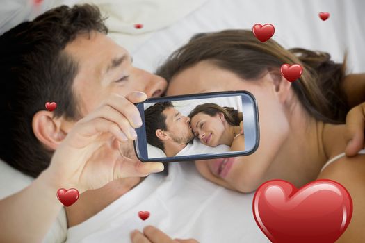 Composite of Couple taking Valentines selfie