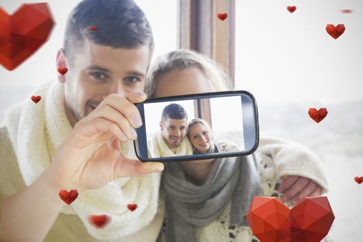 Composite of Couple taking Valentines selfie