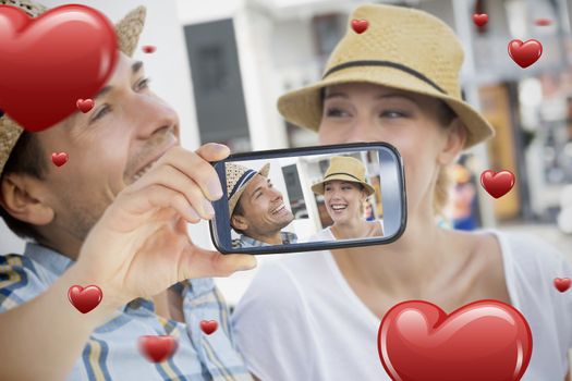 Composite of Couple taking Valentines selfie