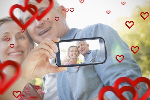 Composite of Couple taking Valentines selfie