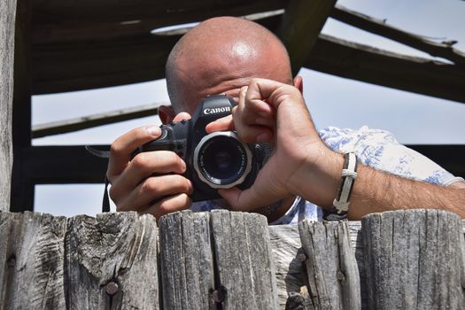 SA STIDDIOSA ITALY 24 JUNE 2019: Photographer in nature in action during a sunny day