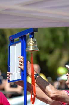 Blue information marker for athletics race run by CEMA track judge