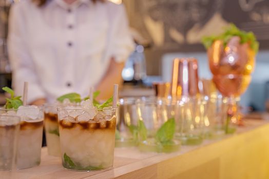 two glasses of mojito at the bar during the celebration event on the anniversary of the venue