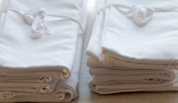 a pile of clean linen towels