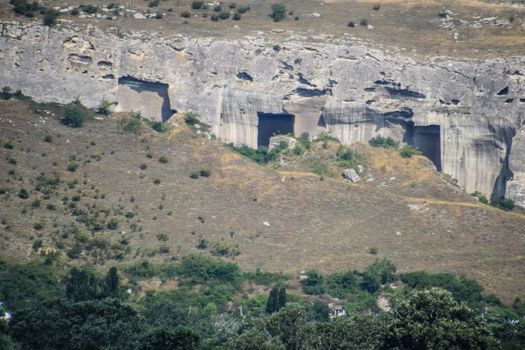 Ancient quarries in the rocks. Evidence of an ancient highly developed civilization. Crimean peninsula.