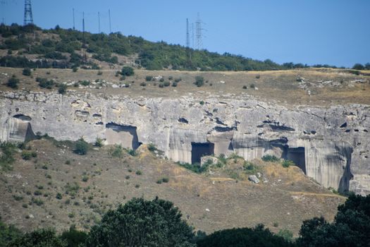 Ancient quarries in the rocks. Evidence of an ancient highly developed civilization. Crimean peninsula.