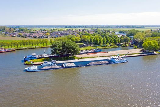 Freighters loading on the Amsterdam Rijnkanaal near Amsterdam in the Netherlands