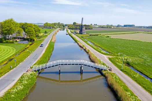 Aerial from the Obdammer windmill in the countryside from the Netherlands