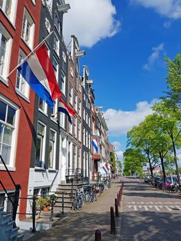 Flags at half mast on memorial day May 4 2020 in Amsterdam the Netherlands