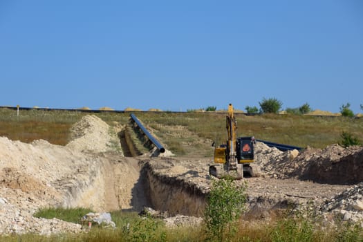 Construction of the pipeline. a Underground gas pipeline, pipeline laying underground.