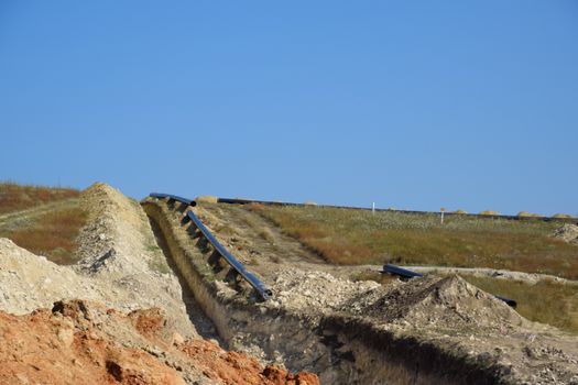 Construction of the pipeline. a Underground gas pipeline, pipeline laying underground.