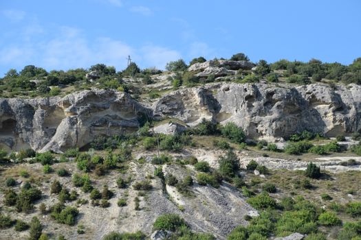 Limestone cliffs with a sample of material, limestone erosion in the rocks.